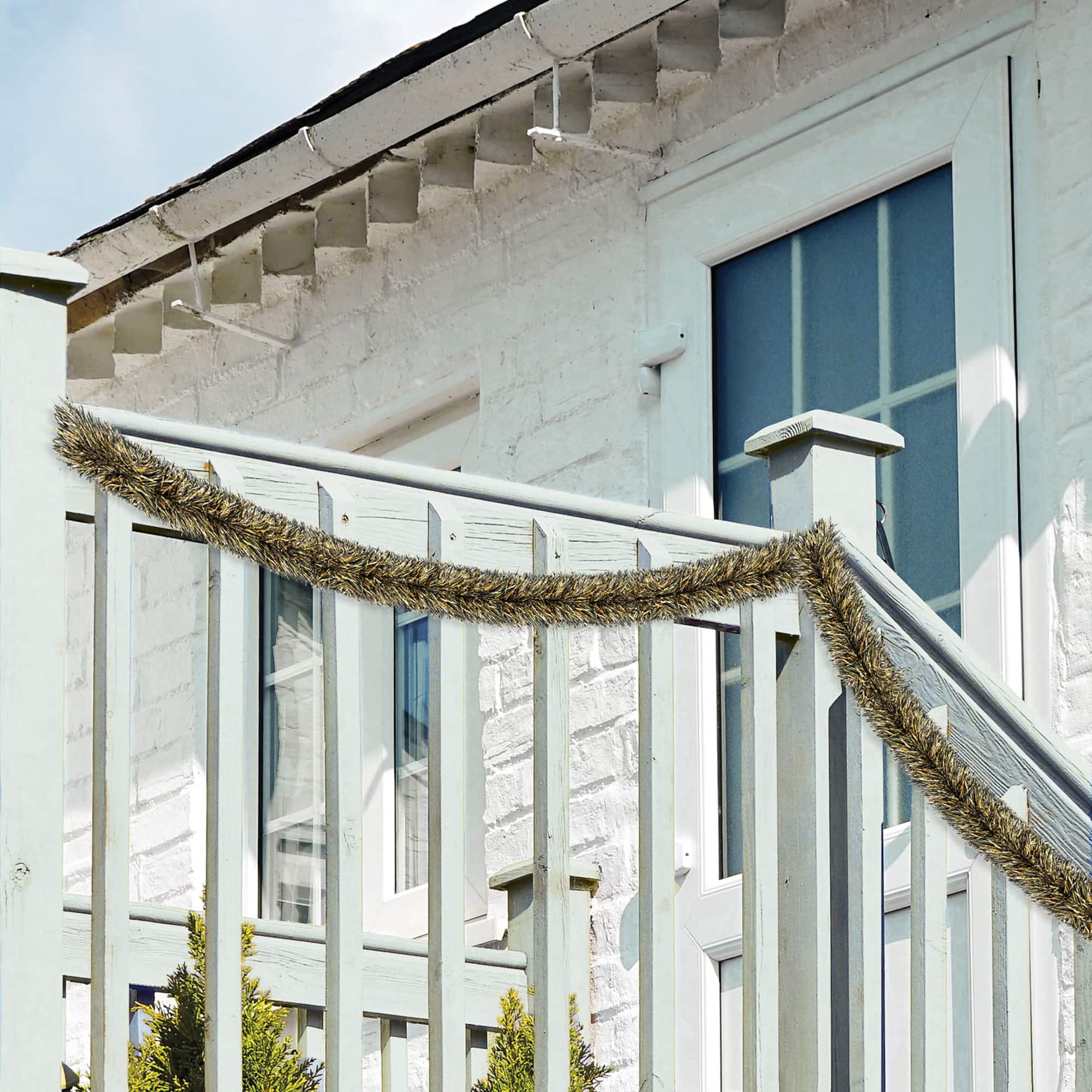 Beistle 15ft. Black & Gold Metallic Tinsel Garland